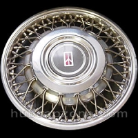 1986-1988 Oldsmobile Delta 88 wire spoke hubcap 14".